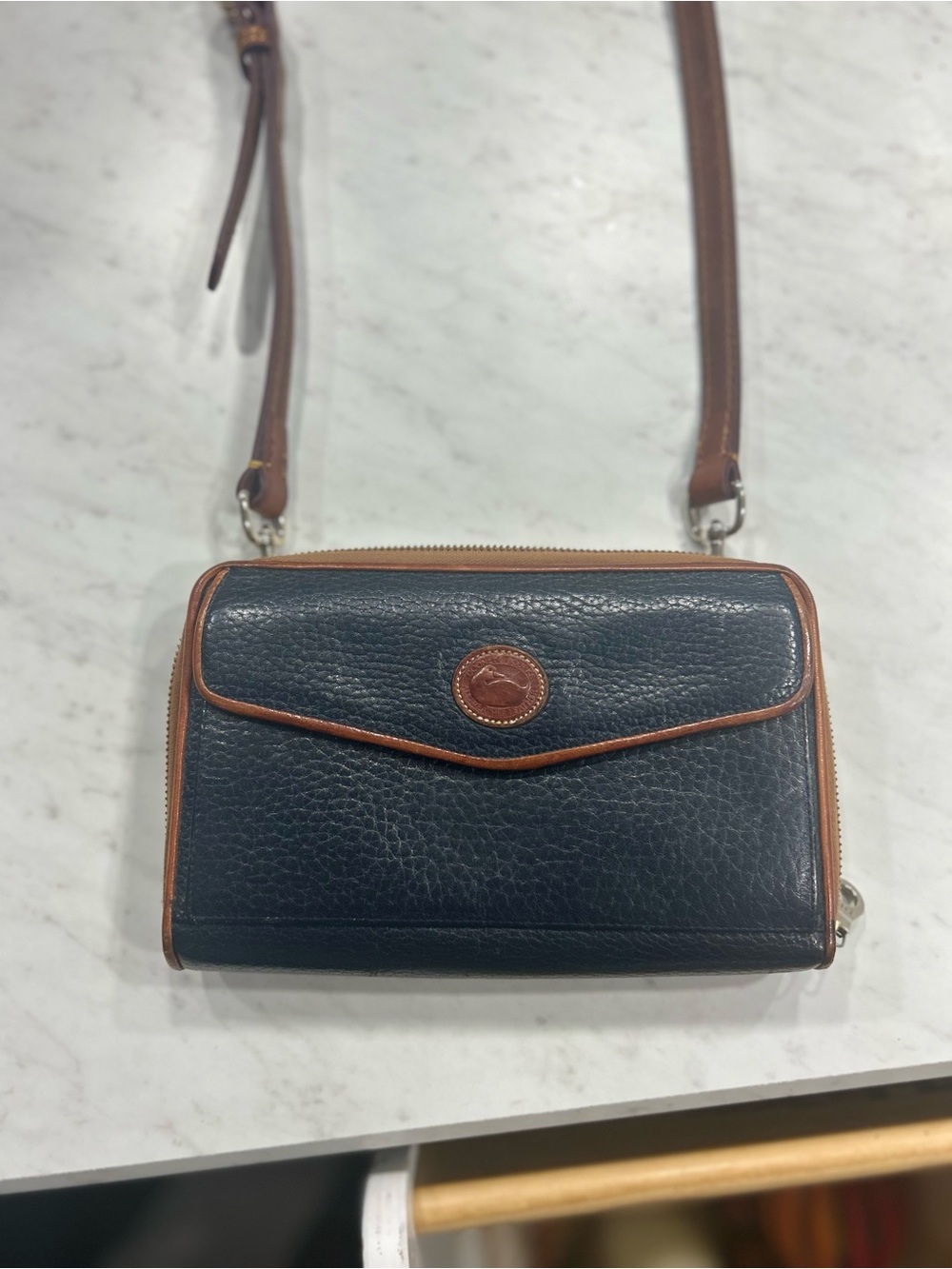 Dooney & Bourke Navy Pebbled Leather Crossbody with Brown Trim